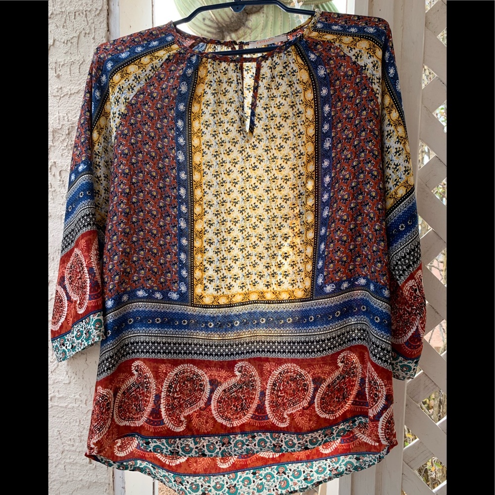 Light weight, 3/4 sleeve blouse.